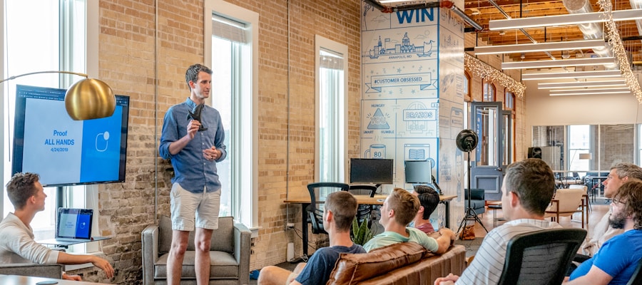 Startup founder presenting a pitch to investors in a modern meeting room